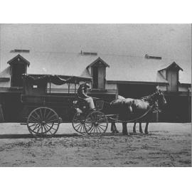 Students seated in a drag in Stable Square [Hawkesbury Agricultural College (HAC)]