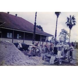 Olympic Swimming Pool - Construction (print 04 of 18) - Students mixing concrete using a large concrete mixer [Hawkesbury Agricultural College (HAC)]