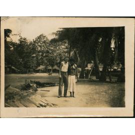 Bluey the cook (left) & the tul tul of Cassia Village (near Hoskins Airfield, New Britain Island, Papua New Guinea)