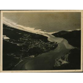 Aerial Photograph - Unidentified coastal town and river mouth