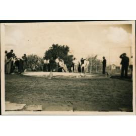Group of students around a pool