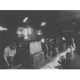 Blacksmith Shop (interior) - Blacksmith DH Reay overseeing work [Hawkesbury Agricultural College (HAC)]